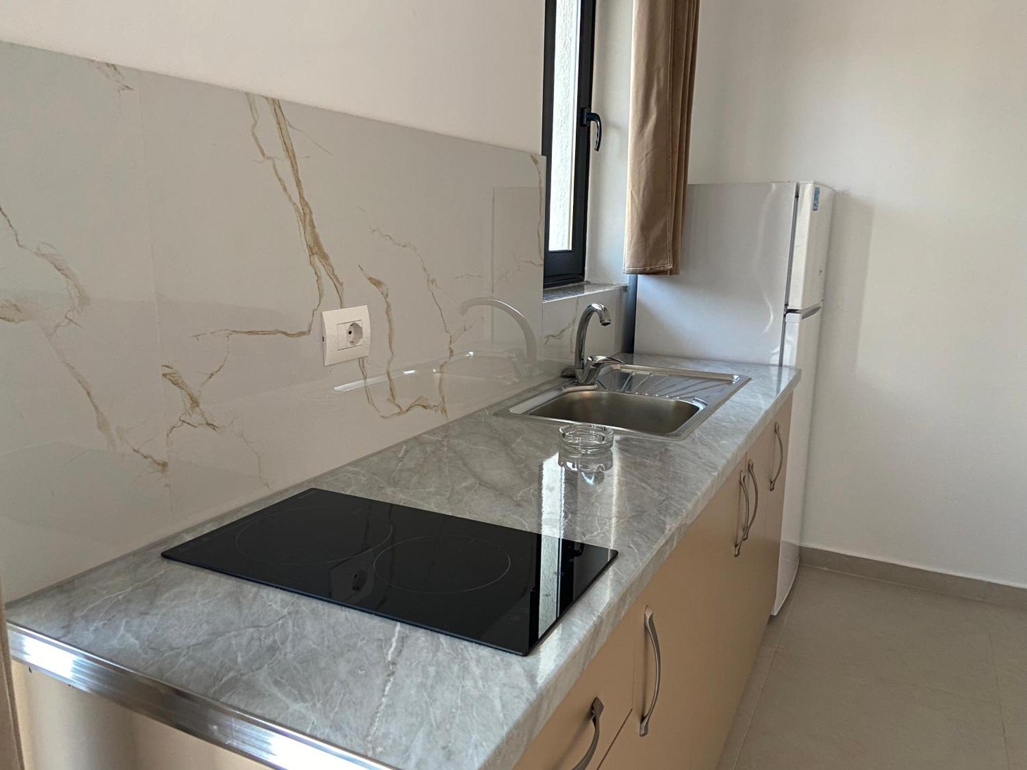 Апартаменты Karafili House Ксамил